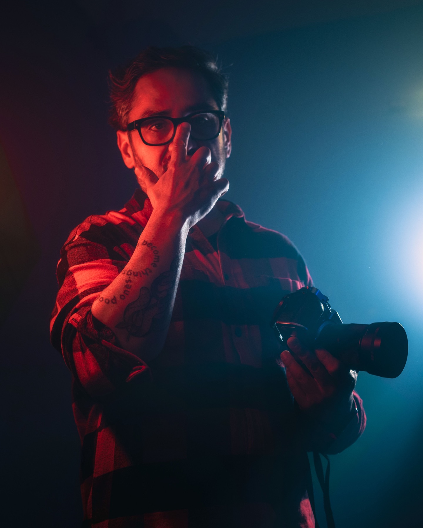 A creative operator behind the camera in a studio environment